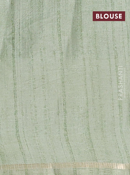 Semi tussar saree multi colour and pastel green with allover zari checks and simple zari woven border