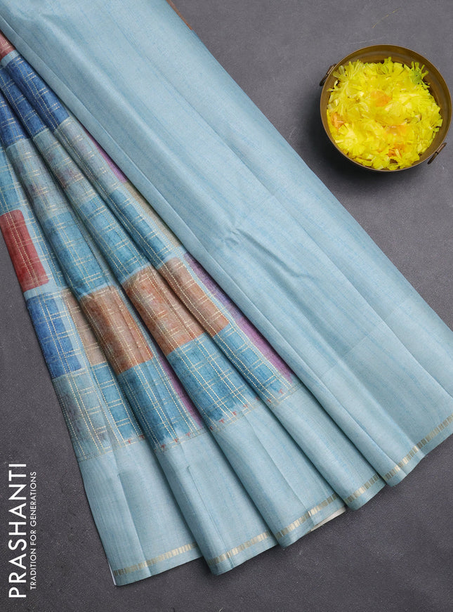 Semi tussar saree multi colour and teal blue with allover zari checks and simple zari woven border