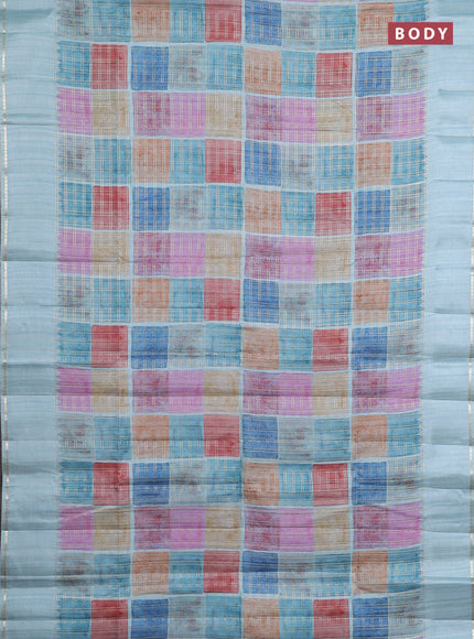 Semi tussar saree multi colour and teal blue with allover zari checks and simple zari woven border