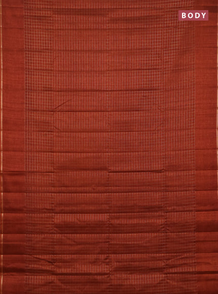 Semi tussar saree rust with allover small zari checked pattern and simple zari woven border