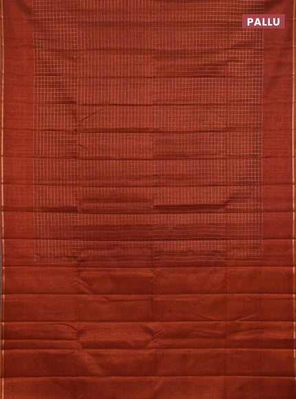 Semi tussar saree rust with allover small zari checked pattern and simple zari woven border