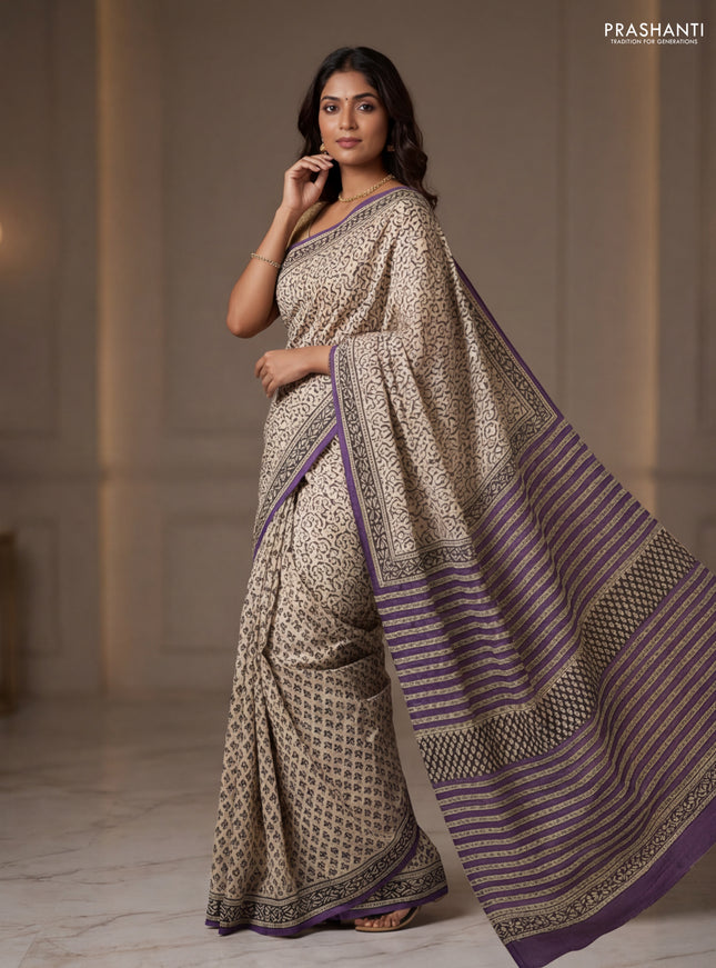 Jaipur cotton partly saree beige and purple with allover prints and printed border