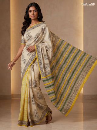 Jaipur cotton patly saree beige and mustard yellow with allover paisley butta prints and printed border