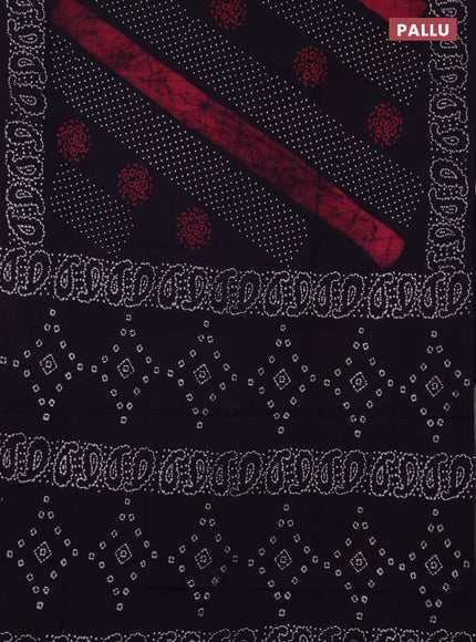 Sungudi cotton saree jamun shade with allover batik prints and printed border