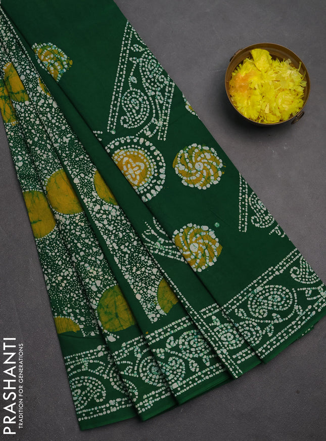 Sungudi cotton saree green with allover batik prints and printed border