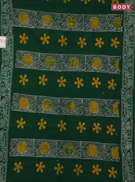 Sungudi cotton saree green with allover batik prints and printed border