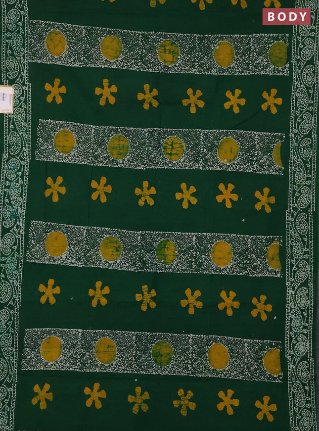 Sungudi cotton saree green with allover batik prints and printed border