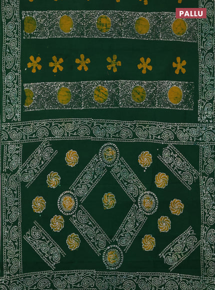 Sungudi cotton saree green with allover batik prints and printed border
