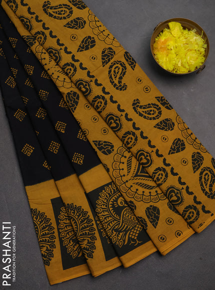 Sungudi cotton saree black and mustard yellow with allover batik butta prints and printed border