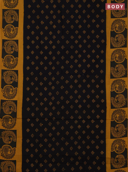 Sungudi cotton saree black and mustard yellow with allover batik butta prints and printed border