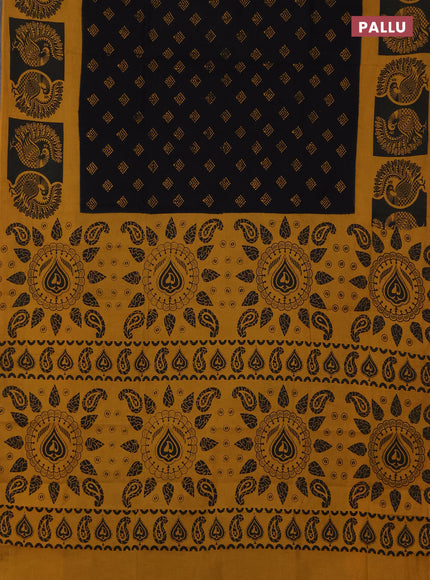 Sungudi cotton saree black and mustard yellow with allover batik butta prints and printed border
