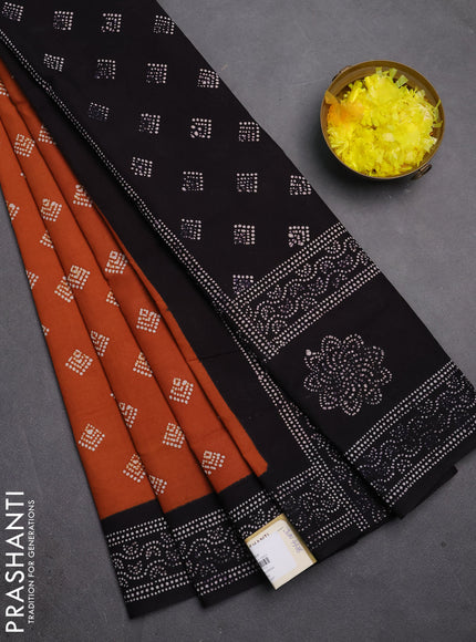Sungudi cotton saree rust shade and navy blue with allover batik butta prints and printed border