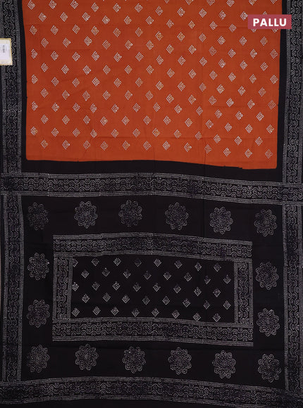 Sungudi cotton saree rust shade and navy blue with allover batik butta prints and printed border