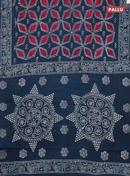 Sungudi cotton saree peacock green and pink with allover batik prints and printed border