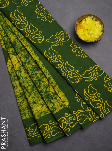 Sungudi cotton saree yellow and sap green with allover batik prints and printed border