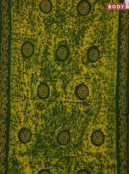 Sungudi cotton saree yellow and sap green with allover batik prints and printed border