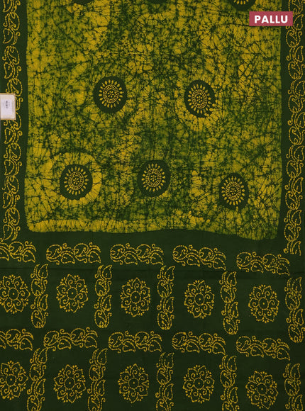 Sungudi cotton saree yellow and sap green with allover batik prints and printed border
