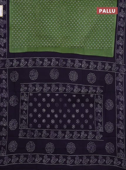 Sungudi cotton saree sap green and deep jamun with allover batik butta prints and printed border