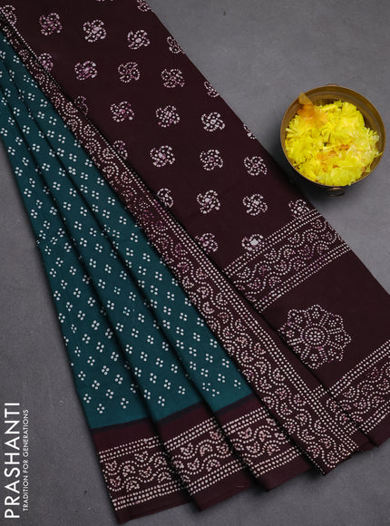 Sungudi cotton saree peacock green and deep wine shade with allover batik prints and printed border