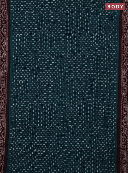 Sungudi cotton saree peacock green and deep wine shade with allover batik prints and printed border