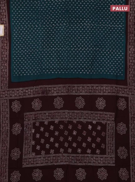 Sungudi cotton saree peacock green and deep wine shade with allover batik prints and printed border
