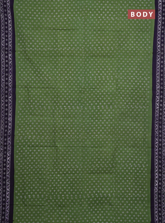 Sungudi cotton saree sap green with allover batik prints and printed border