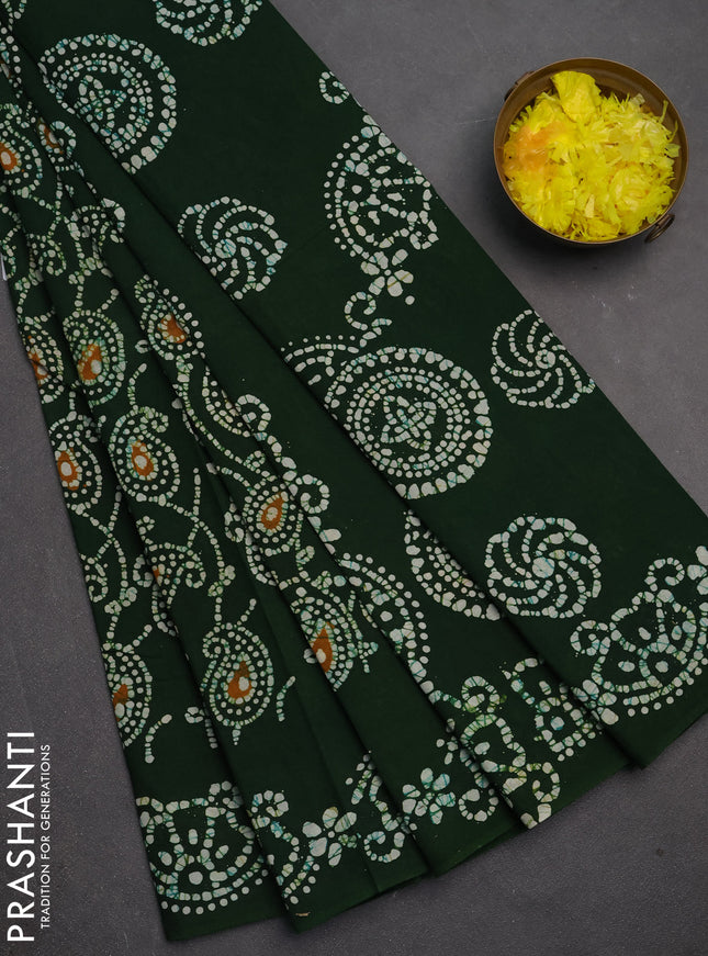 Sungudi cotton saree sap green with allover batik prints and printed border