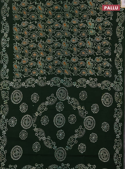Sungudi cotton saree sap green with allover batik prints and printed border