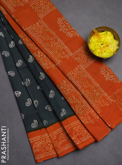Sungudi cotton saree greyish green and mustard yellow with allover batik prints and printed border