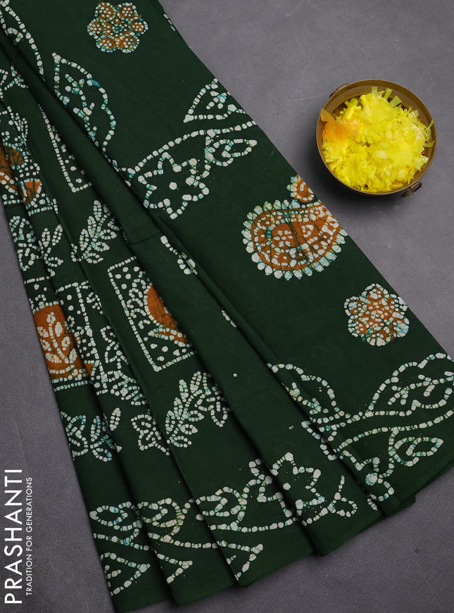 Sungudi cotton saree green with allover batik prints and printed border