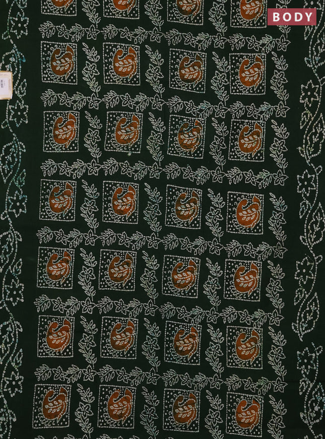 Sungudi cotton saree green with allover batik prints and printed border