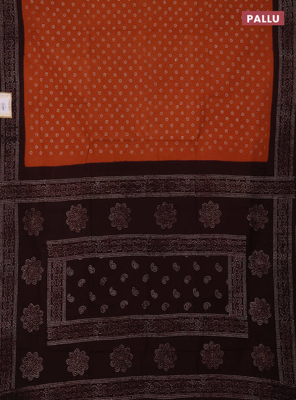 Sungudi cotton saree rust shade and wine with allover batik butta prints and printed border