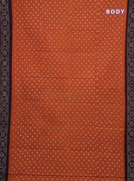 Sungudi cotton saree rust shade and coffee brown with allover batik butta prints and printed border