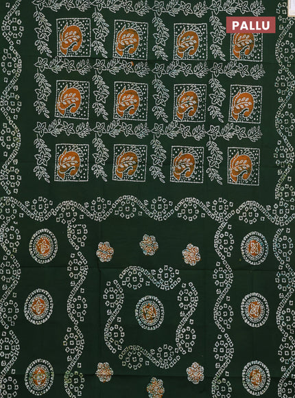 Sungudi cotton saree sap green with allover batik butta prints and printed border