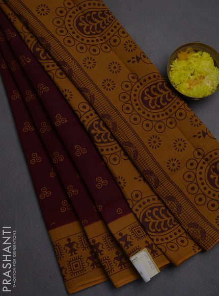 Sungudi cotton saree deep maroon and mustard yellow with allover batik butta prints and warli printed border