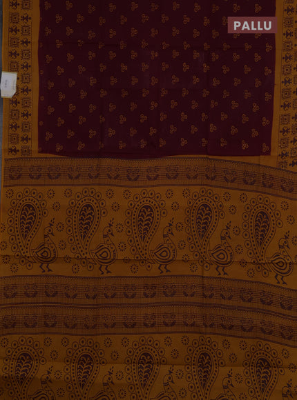Sungudi cotton saree deep maroon and mustard yellow with allover batik butta prints and warli printed border