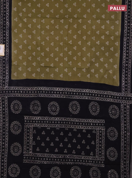 Sungudi cotton saree elaichi green and navy blue with allover batik butta prints and printed border