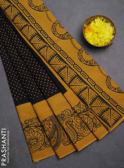 Sungudi cotton saree black and mustard yellow with allover polka dot prints and printed border
