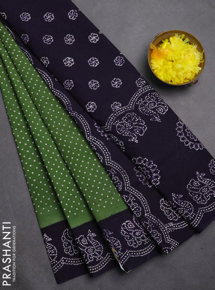 Sungudi cotton saree green shade and violet with allover polka dot prints and printed border