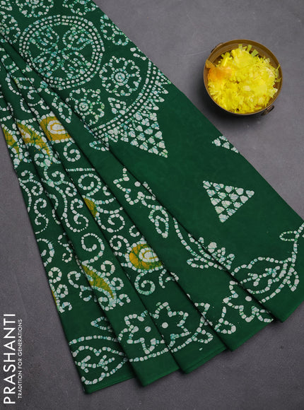 Sungudi cotton saree green with allover batik prints and printed border