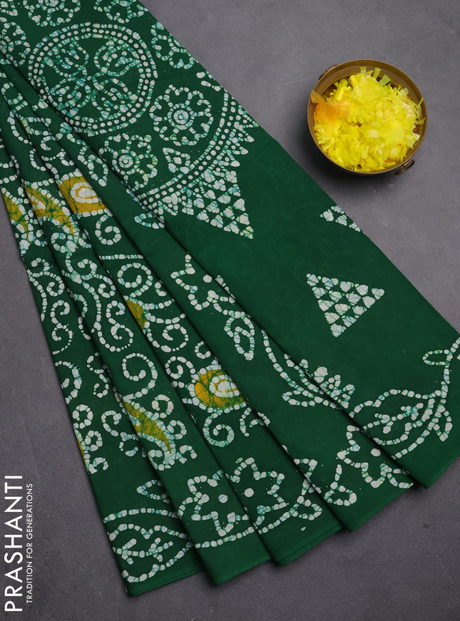 Sungudi cotton saree green with allover batik prints and printed border