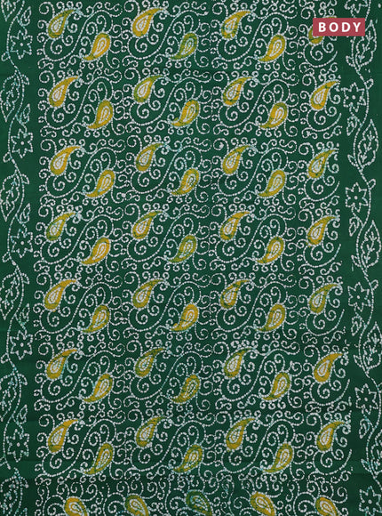 Sungudi cotton saree green with allover batik prints and printed border