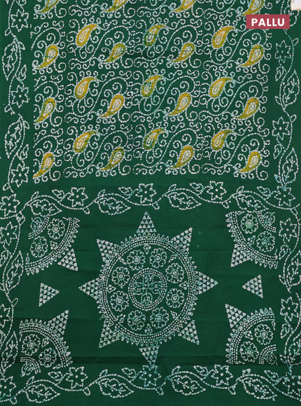 Sungudi cotton saree green with allover batik prints and printed border