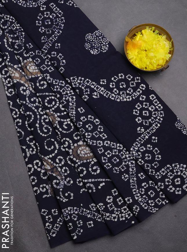 Sungudi cotton saree navy blue with allover batik prints and printed border