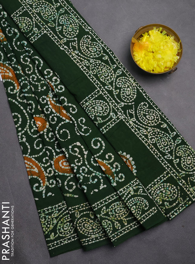 Sungudi cotton saree green with allover batik prints and printed border