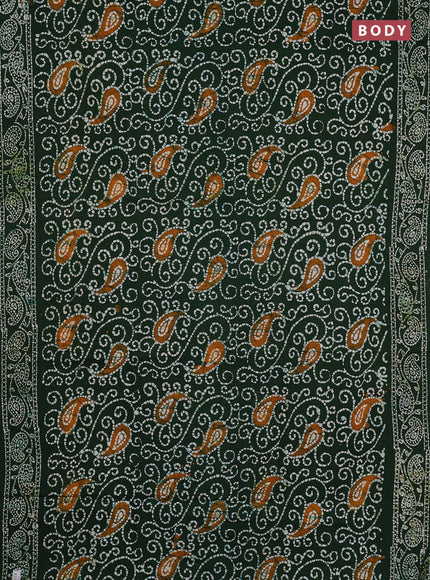Sungudi cotton saree green with allover batik prints and printed border