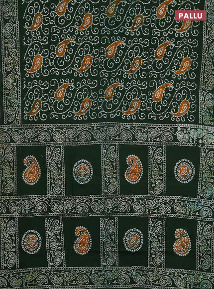 Sungudi cotton saree green with allover batik prints and printed border
