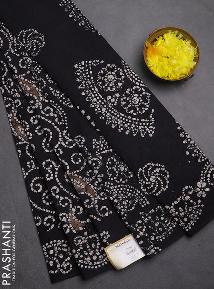 Sungudi cotton saree black with allover batik prints and printed border