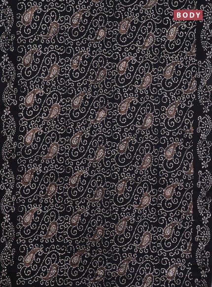 Sungudi cotton saree black with allover batik prints and printed border