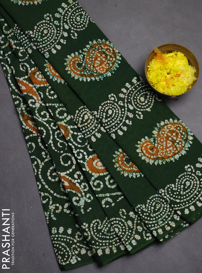 Sungudi cotton saree green with allover batik prints and printed border